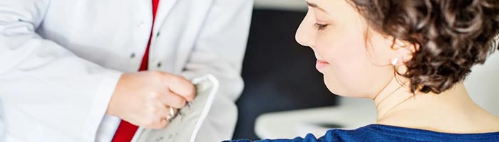 woman having blood presure test